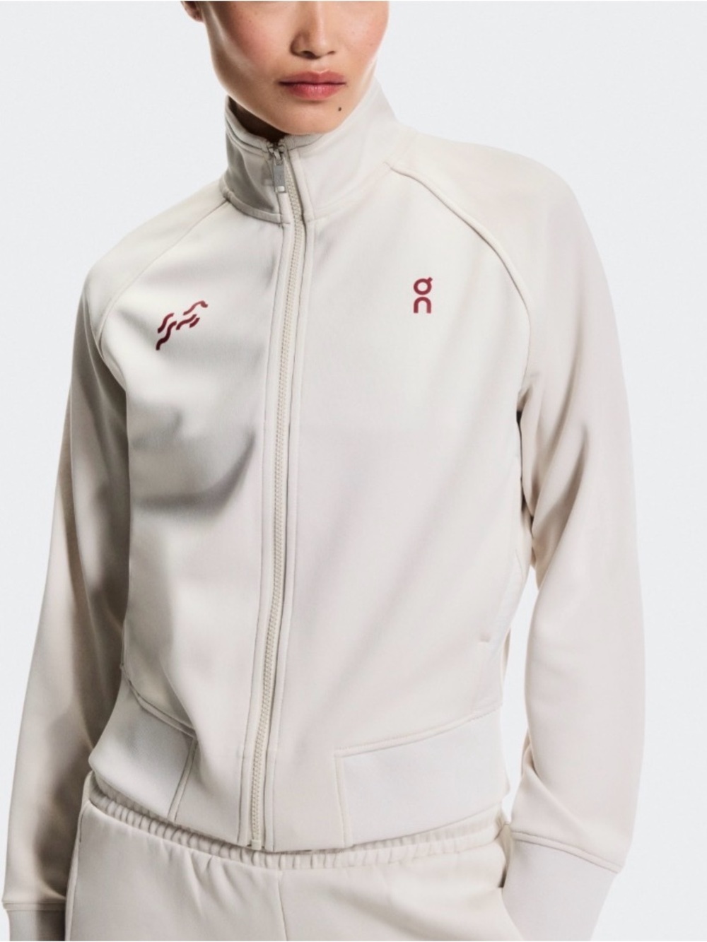 On Running Women's Cream Zip-Up Bomber Jacket with Maroon Logos